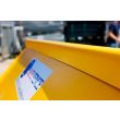 Seam of Yellow Forklift Tipping Skip