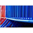 Close-up of blue barrier stack, focusing on interlocked curved frames and welded joints.