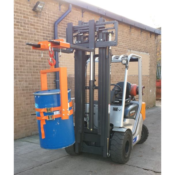 Forklift-mounted crane drum tilter with adjustable hook attachment holding blue drum for efficient material handling operations.
