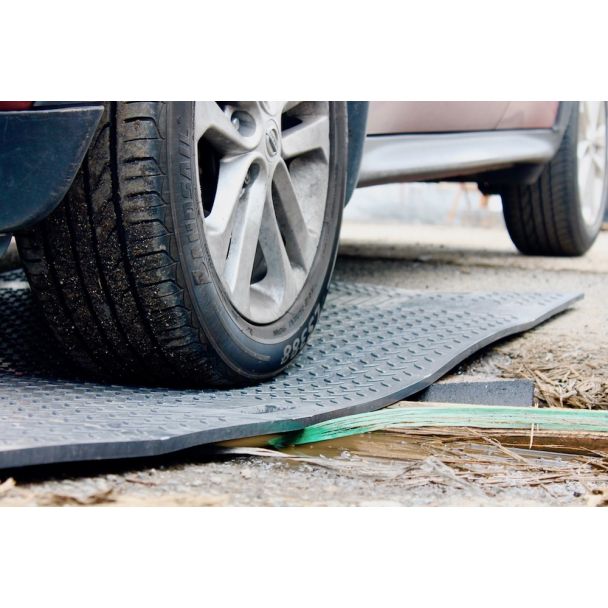 Vehicle on Heavy Duty Ground Mat